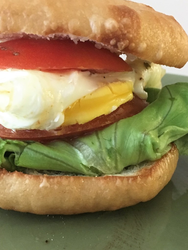 A bagel breakfast sandwidch